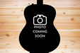 Placeholder image with 'Photo Coming Soon' text inside a guitar silhouette on a wooden background